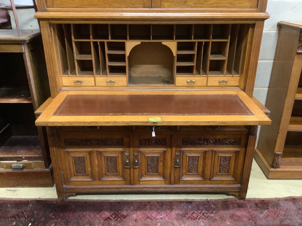 A large Victorian oak secretaire bookcase, width 144cm, depth 61cm, height 290cm, believed to originate from the Hull area having belonged to a member of the Strachan family